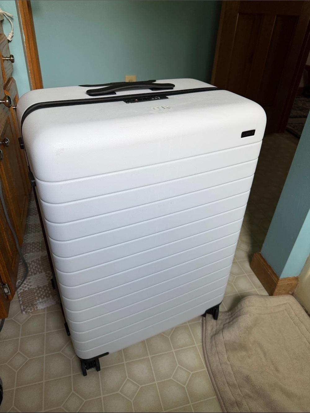 Away White Hardshell Spinner Suitcase with Black Accents